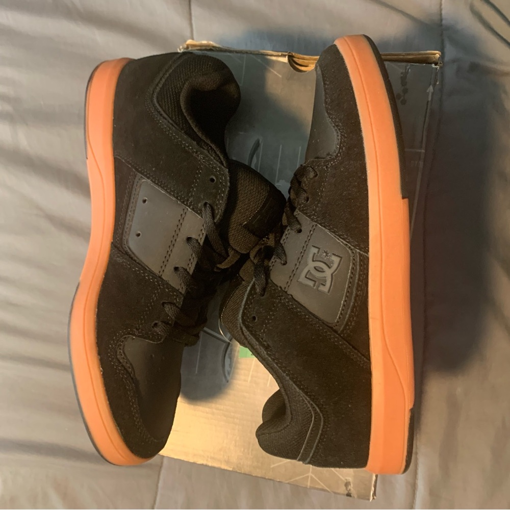 Men’s DC shoes size 9.5 US. Brand new in box